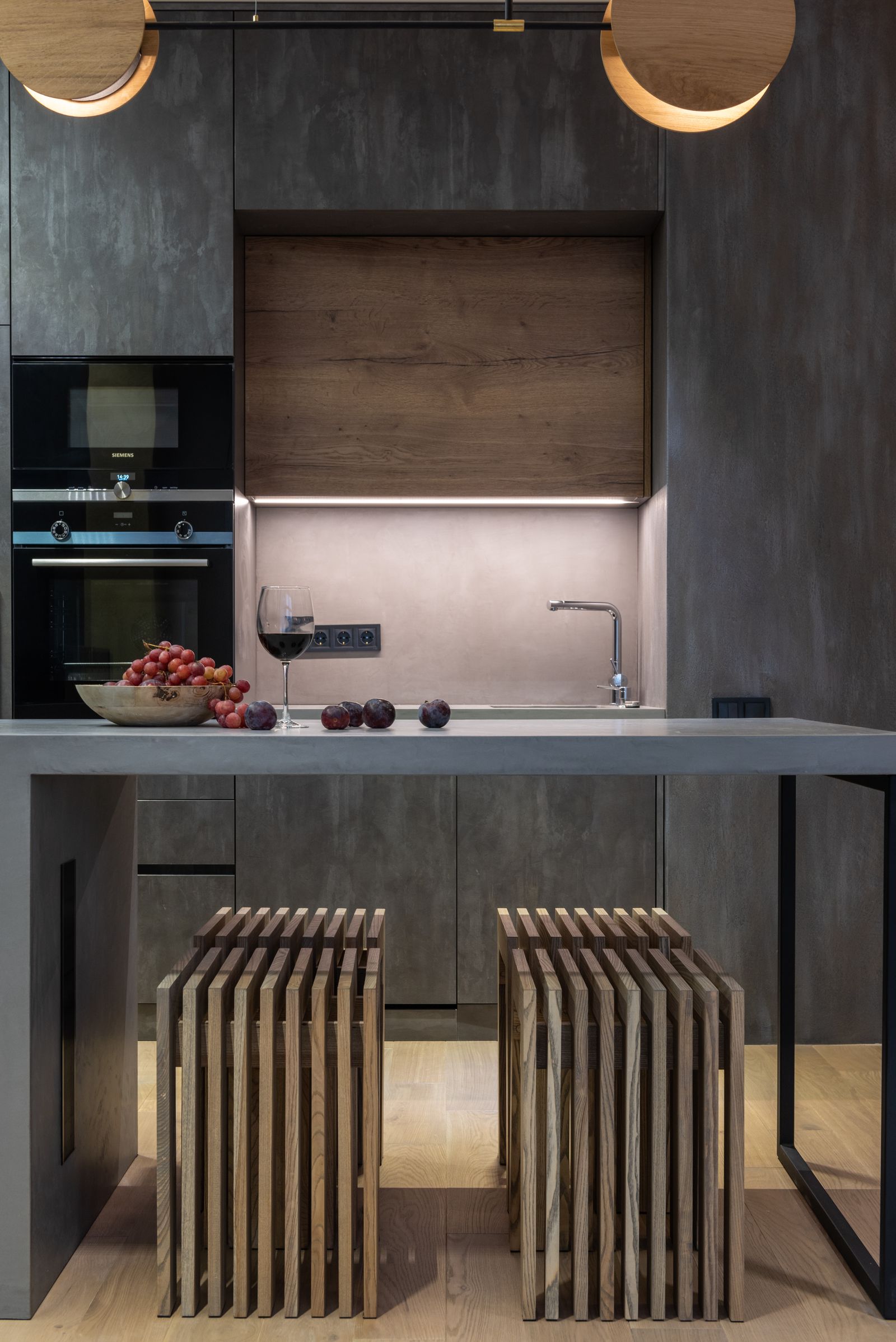 Custom kitchen cabinetry and island built by the Copper & Co. crew